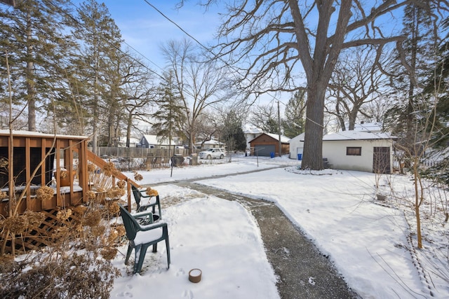 view of yard covered in snow