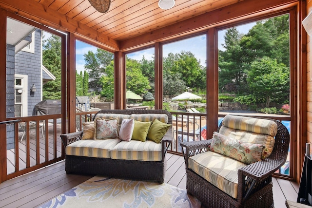 sunroom / solarium with wood ceiling