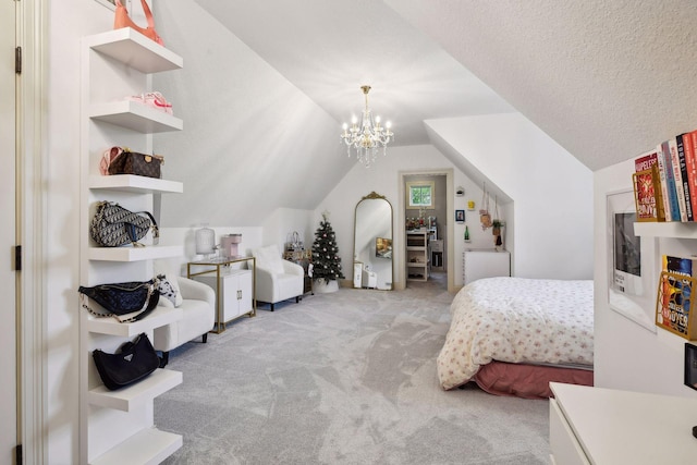 carpeted bedroom featuring a textured ceiling, an inviting chandelier, and lofted ceiling