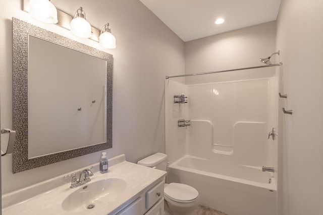 full bathroom featuring shower / washtub combination, vanity, and toilet