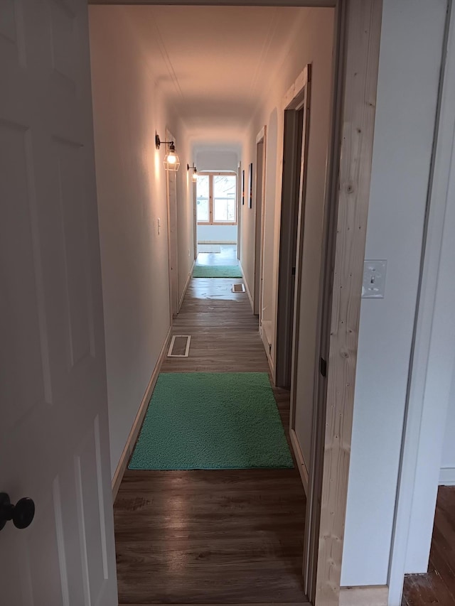 hallway featuring dark hardwood / wood-style floors