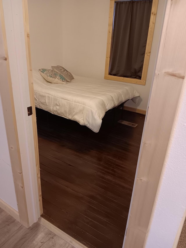 bedroom featuring light wood-type flooring