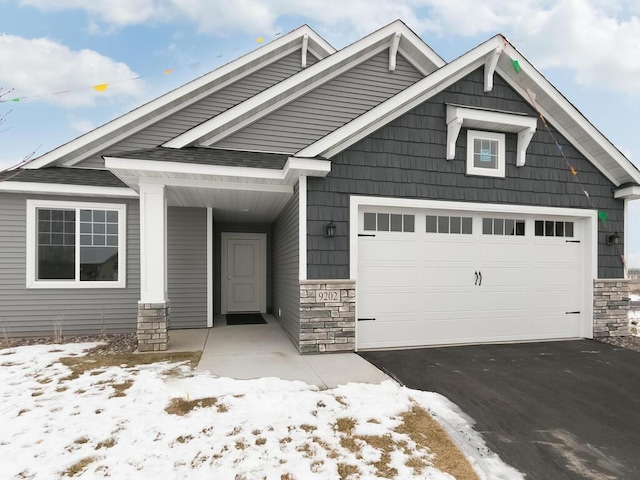 craftsman house featuring a garage