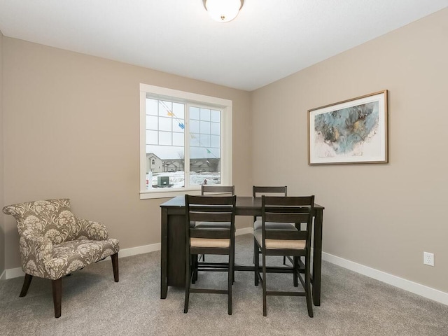 dining area with carpet