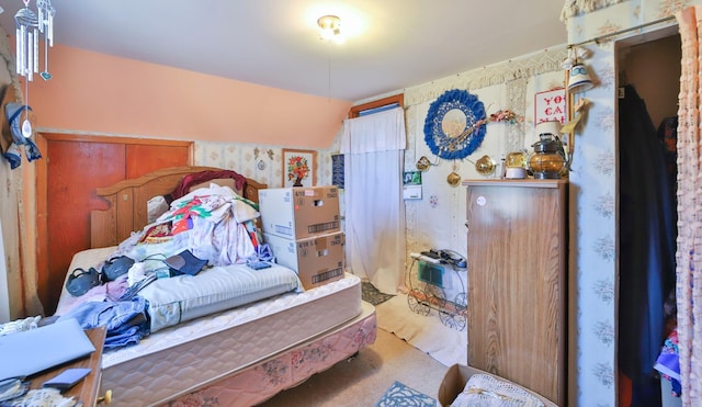 bedroom with lofted ceiling