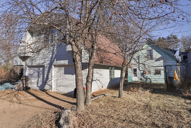 view of home's exterior with a garage