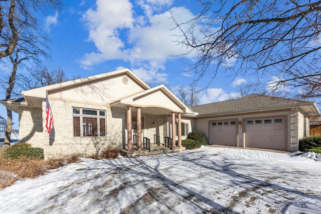 view of front of property featuring a garage