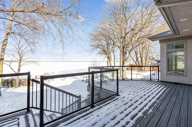 view of snow covered deck