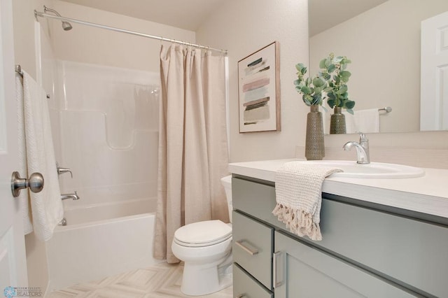 full bathroom with shower / tub combo, vanity, and toilet