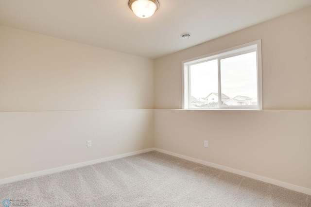 spare room with carpet flooring