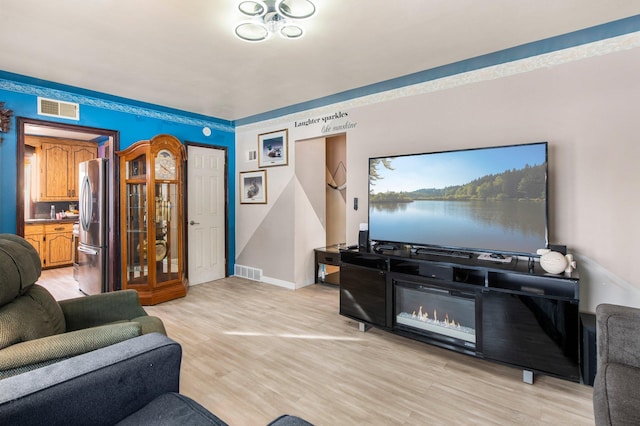 living room with light wood-type flooring