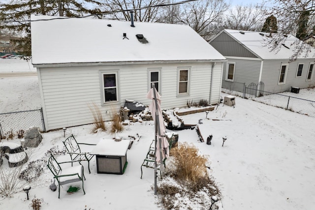 view of snow covered property