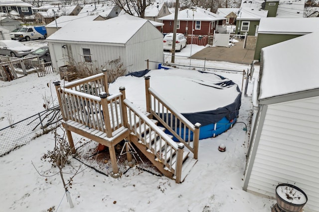 view of snow covered deck