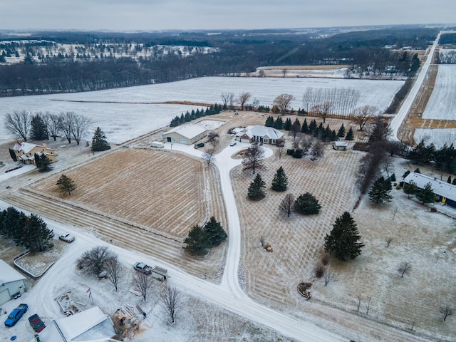 snowy aerial view with a rural view