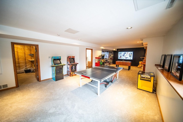 rec room with light carpet