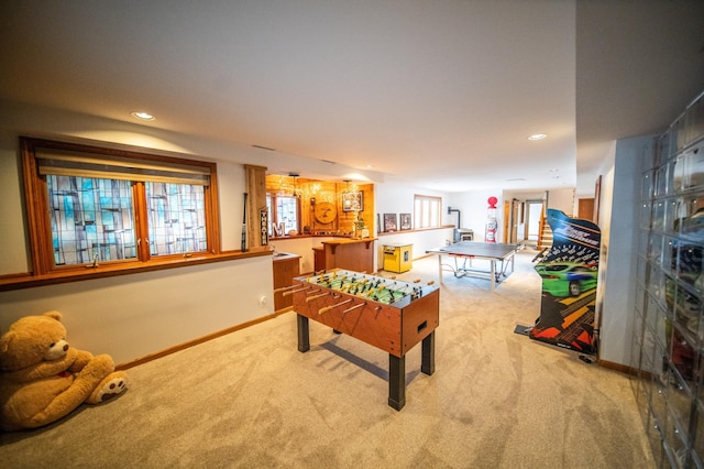 playroom with light colored carpet