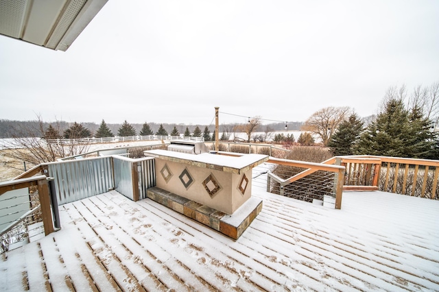 view of snow covered deck