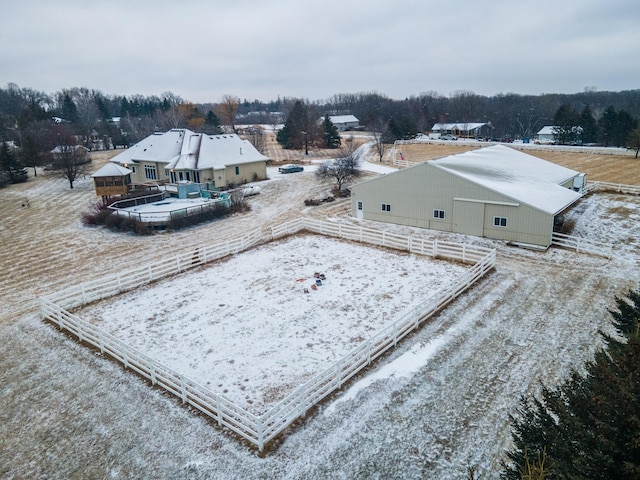 birds eye view of property featuring a rural view