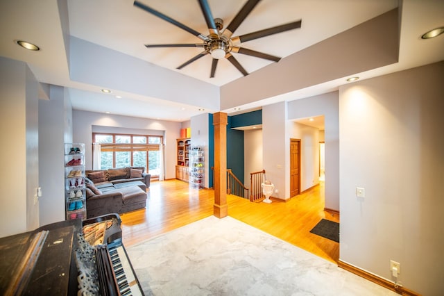 62539 185th Ave, Dodge Center, MN 55927 - living area with a ceiling fan, light wood-type flooring, baseboards, recessed lighting, and a raised ceiling