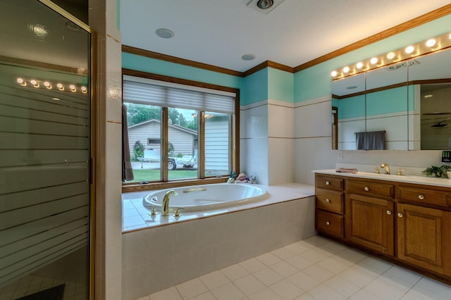 bathroom with tile patterned floors, vanity, crown molding, and plus walk in shower