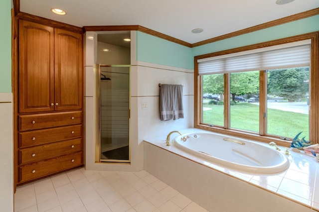 bathroom with tile patterned flooring, independent shower and bath, and ornamental molding