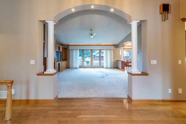 living room featuring ceiling fan and light hardwood / wood-style flooring