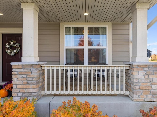 entrance to property featuring covered porch