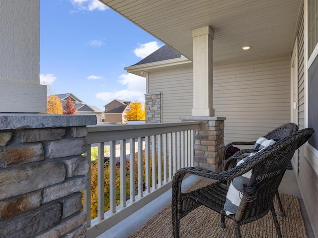 balcony featuring covered porch