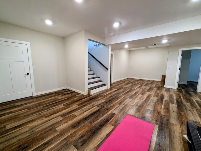 basement with dark wood-type flooring