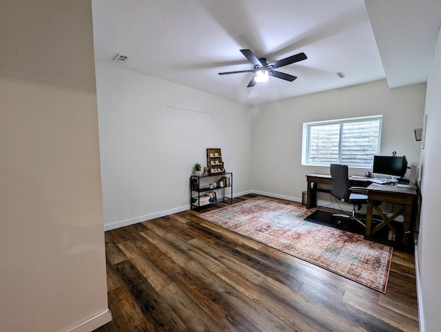 office space featuring ceiling fan and dark hardwood / wood-style floors