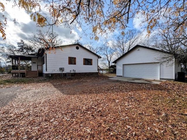 view of property exterior featuring a garage