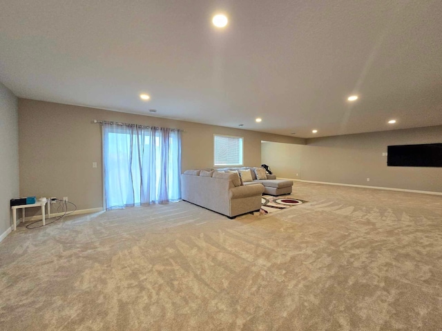 unfurnished living room with light carpet