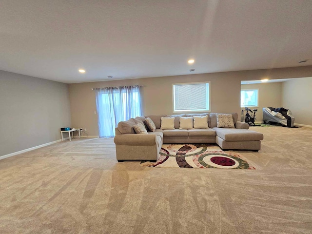 living room featuring light carpet