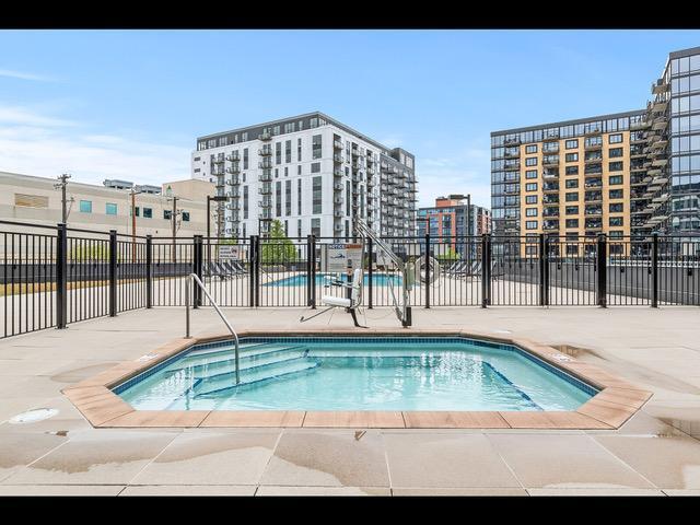 view of swimming pool with a patio area