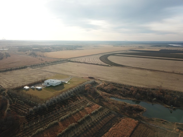 aerial view featuring a water view and a rural view