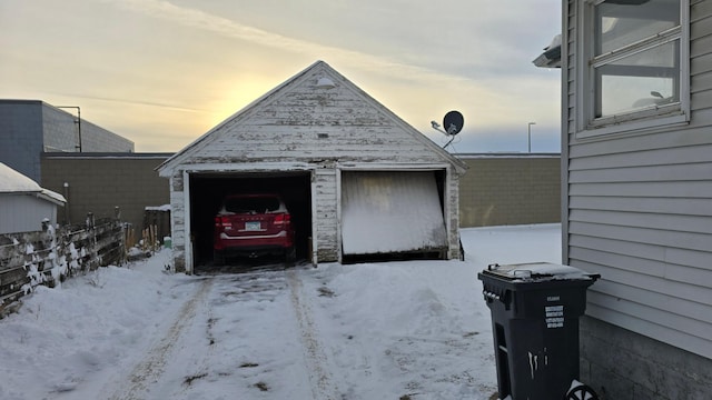 view of snow covered garage