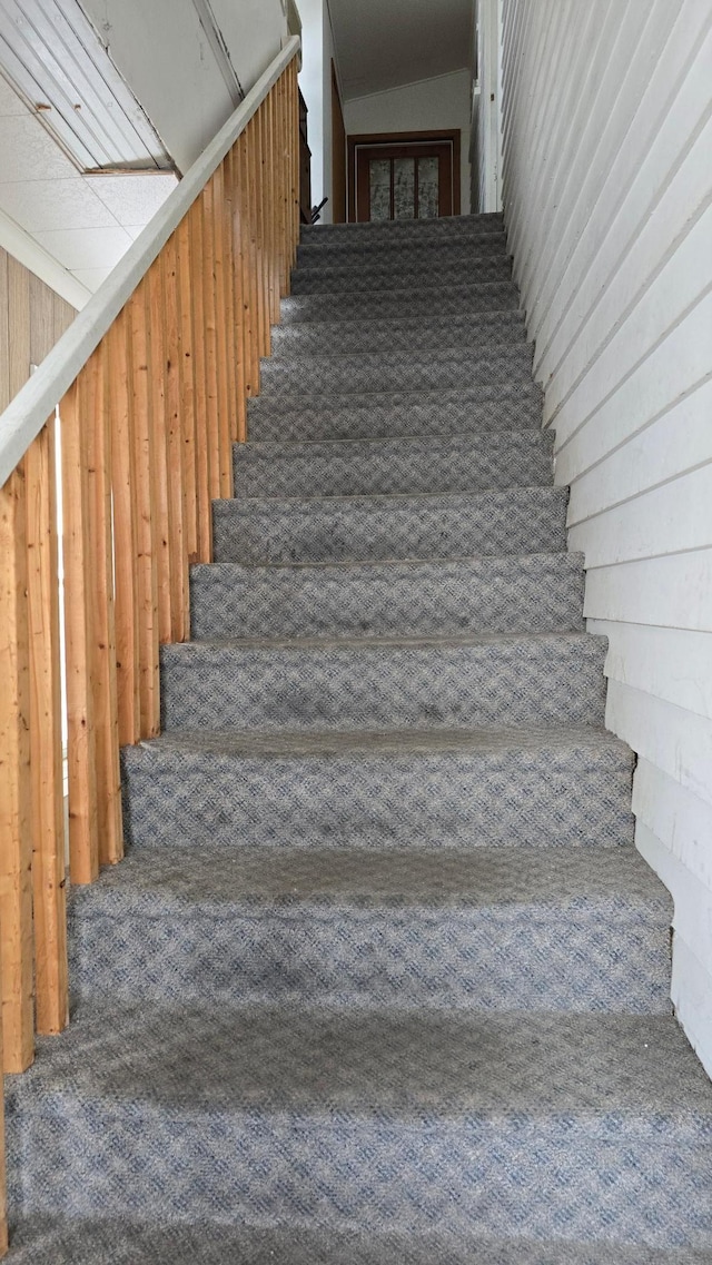 stairs with wooden walls