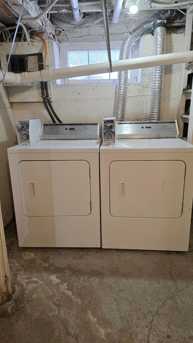 washroom with washer and dryer