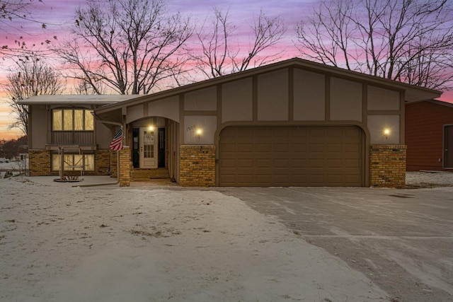 view of front of property with a garage