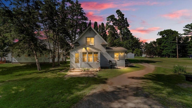 205 Broadway St SE, Isanti, MN 55040 - view of front of home with a front yard