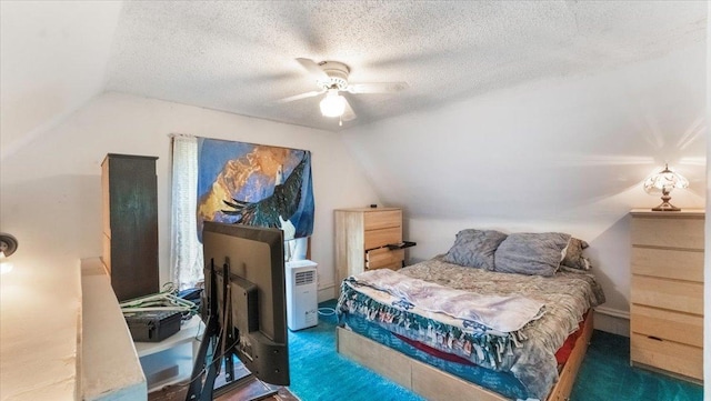 205 Broadway St SE, Isanti, MN 55040 - bedroom featuring vaulted ceiling, carpet, ceiling fan, and a textured ceiling