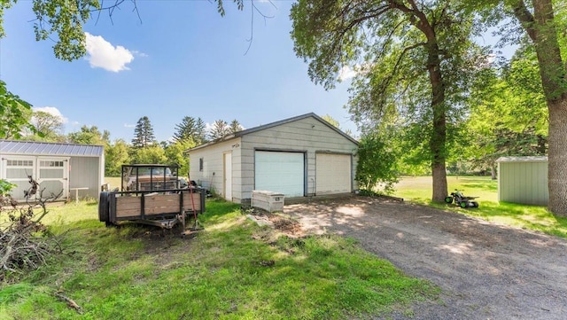 205 Broadway St SE, Isanti, MN 55040 - view of detached garage