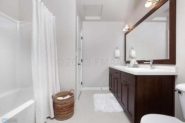 full bathroom featuring vanity, toilet, and shower / tub combo