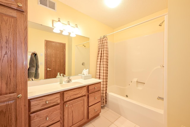 bathroom featuring tile patterned floors, shower / bathtub combination with curtain, visible vents, and vanity