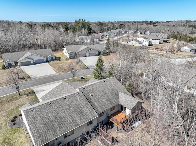 birds eye view of property with a residential view