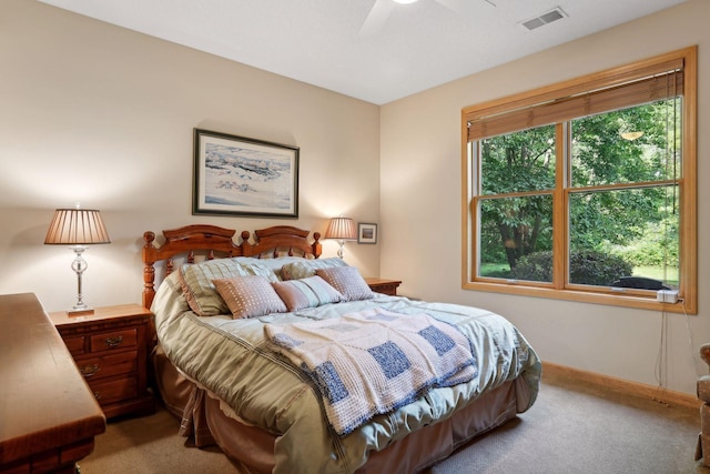 carpeted bedroom with ceiling fan