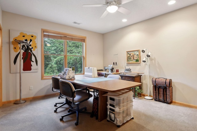 carpeted office with ceiling fan