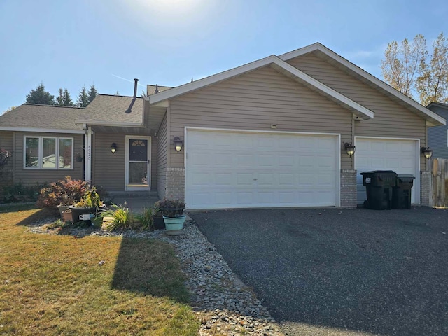 ranch-style home with a garage