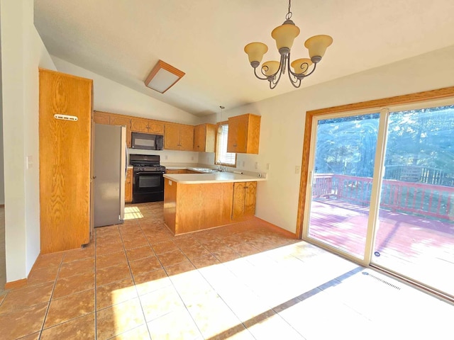 kitchen featuring black appliances, hanging light fixtures, vaulted ceiling, kitchen peninsula, and a chandelier