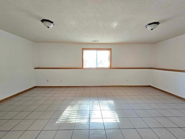 view of tiled spare room